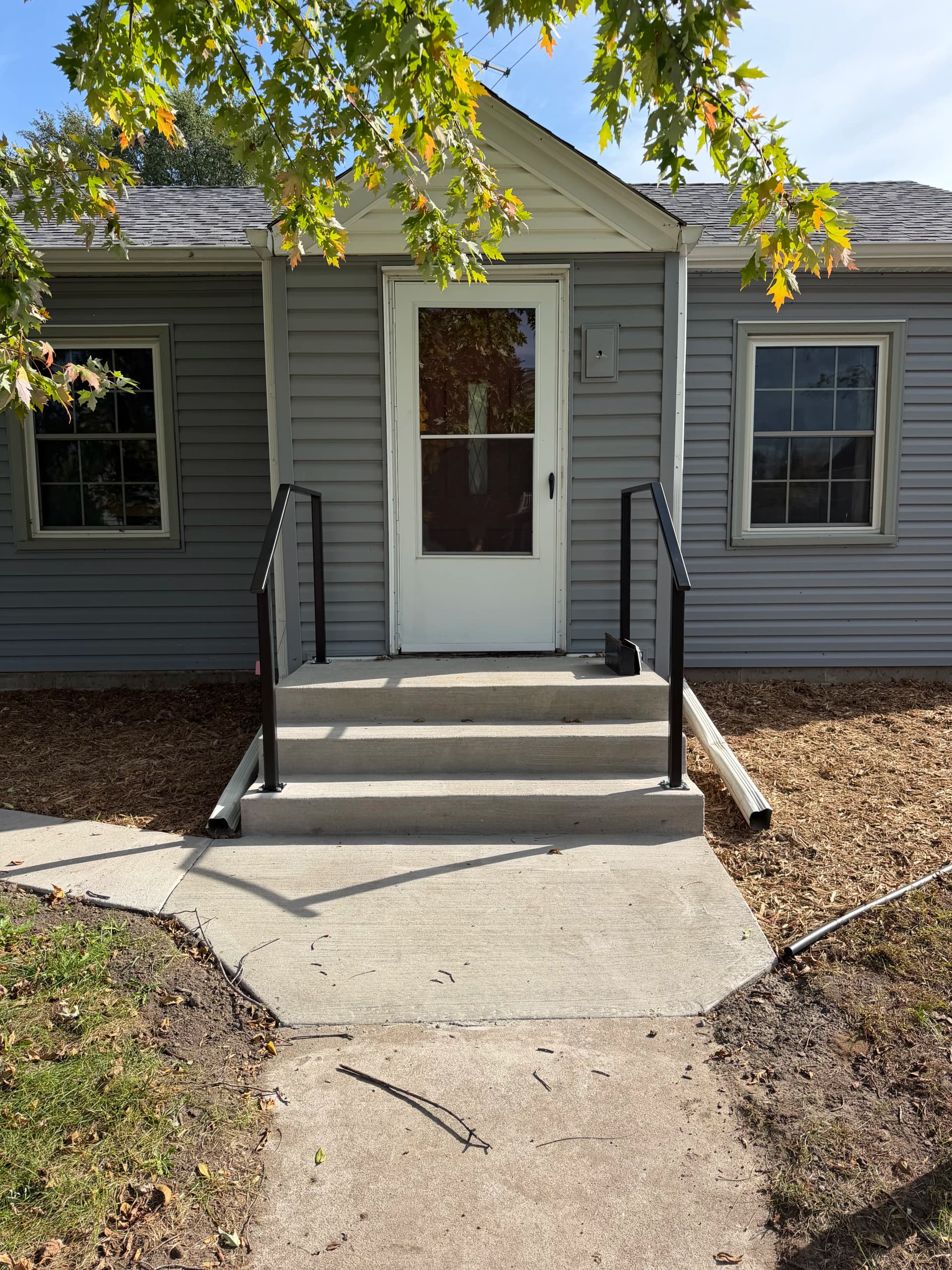 Gallery photos for Steel Handrail Install on Concrete Steps in St. Paul: Image #1