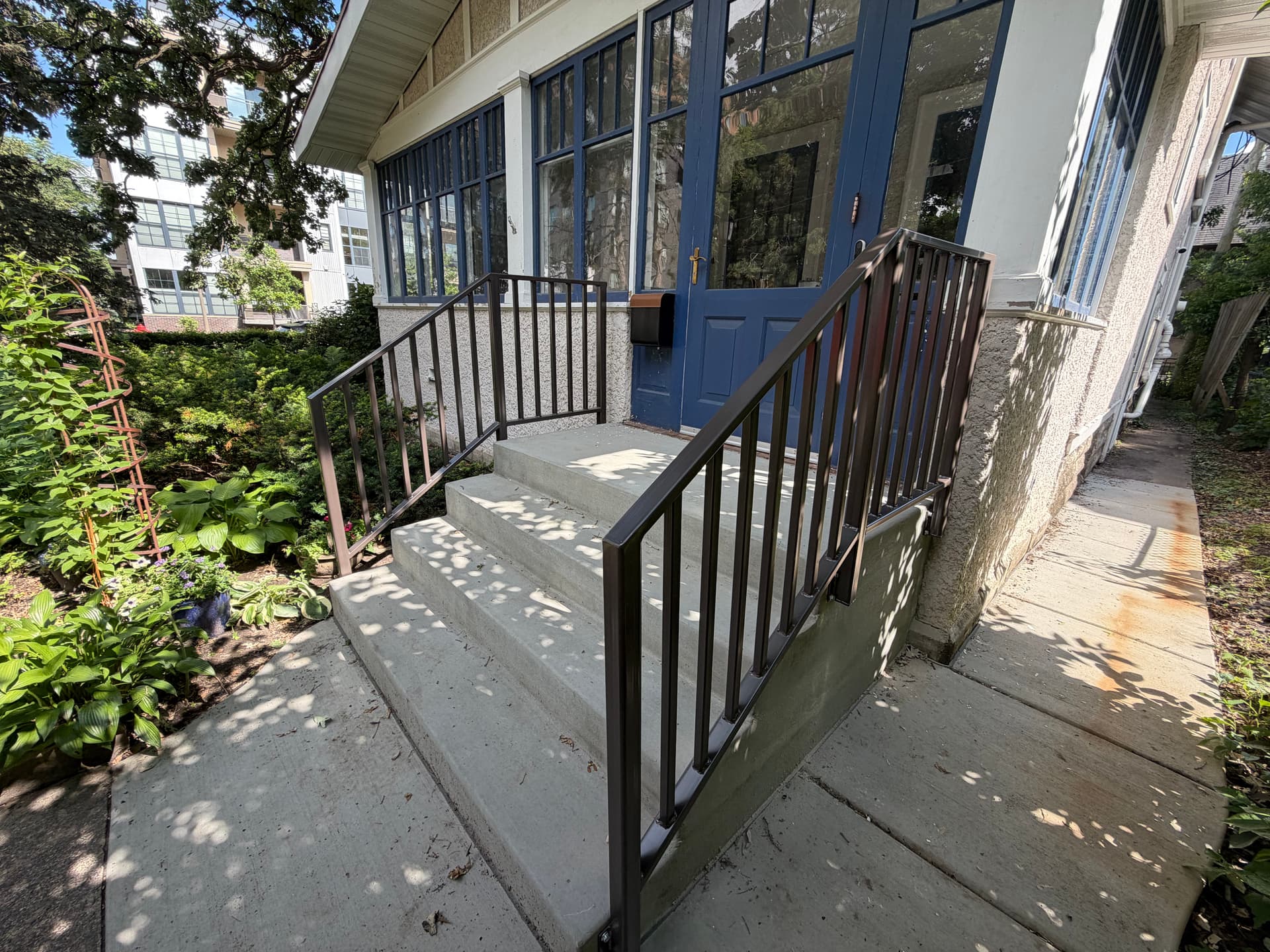 Gallery photos for 3 Custom Handrails That Actually Look Good on Concrete Steps: Image #1