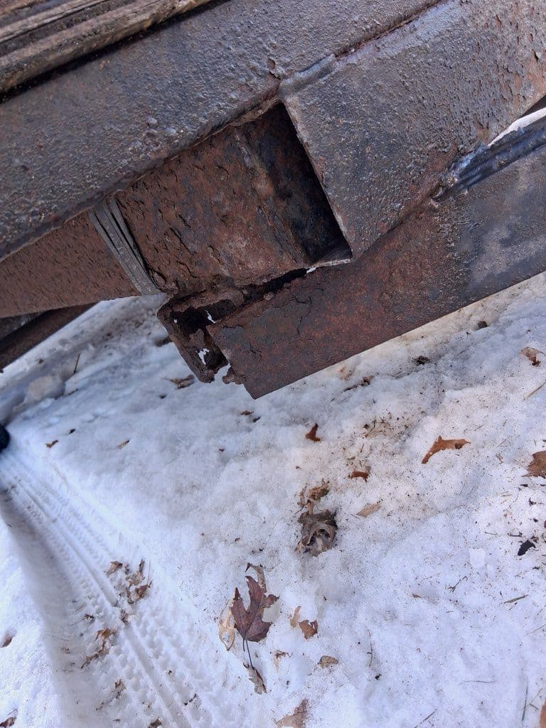Rusty Dump Trailer Hitch Reinforced With Expert Welding