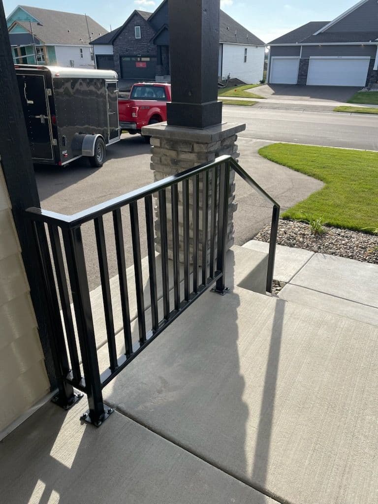Gallery photos for Sleek Metal Railing Installation for Porch Steps: Image #1